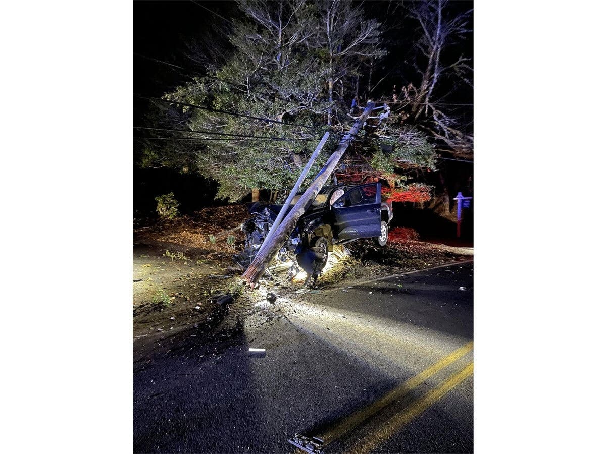 A photo by police shows a pickup truck that hit a utility pole Thursday night in Falmouth.