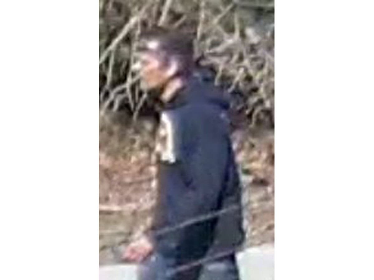 Barnstable police released this photo of a man wanted for questioning related to a massive brush fire on Cape Cod.