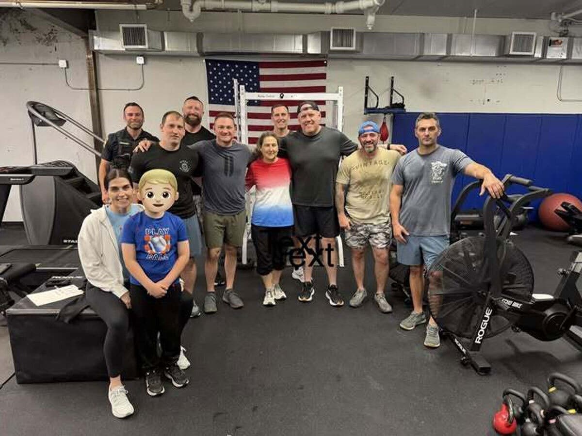 Braintree police personnel gather on Memorial Day, when they held a group workout, known as "The Murph," to recognize the country's fallen heroes.