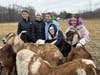 Upon arrival at the farm, Troop 65136 helped with socialization of the friendly goats by feeding them pumpkins and providing lots of loving hugs and pets.