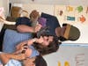 A student blows on her Shofar.