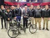 Last May, CEET Dean Dave Grewell stands with the NIU at RVC fluid powered bicycle team that won Grand Champion laurels at the National Fluid Power Association competition in Ames, Iowa—the second consecutive year NIU at RVC students took first place.