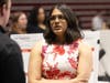 Aditi Venkatesh speaks to a visitor at her team's booth during the Senior Design Showcase at the NIU Convocation Center last month.