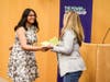 Aditi Venkatesh accepts congratulations last summer at a ComEd ceremony. She has interned with ComEd the past two summers—a connection that came from an engineering job and internship fair that has launched countless other Huskies in their careers.