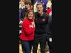 Jill Manchester (L) of Windy City Sweets in Chicago's Lakeview neighborhood and Nebraska basketball coast Fred Hoiberg. Manchester and her husband, John, gifted Hoiberg a molded chocolate basketball with the Nebraska logo. 