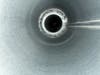 Angel's Duct Cleaning uses a brush to sweep away dust and debris from ductwork.