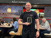 Pasquale Oscar Gencarelli accepts the 2026 Pizza Olympics First Place award from Packanack Community Church.