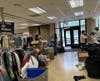 Volunteers unpack and organize donations for the UMCL Rummage Sale, October 2 and 3, in Libertyville. 