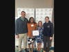 Yasmin Goodley (second from left) celebrates her award presented by Horizons National; from left to right, she is pictured with Executive Director Patrick Owens, Development Director Katie McKinney, and Program Director Kelly Wosleger.