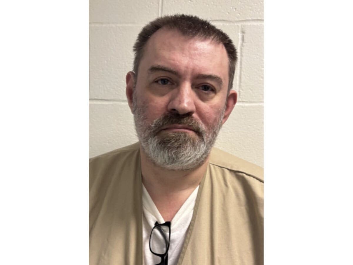 Paul W. Melnick, 48, of Newtown, was taken into custody and is facing multiple charges in an ongoing investigation, according to police.