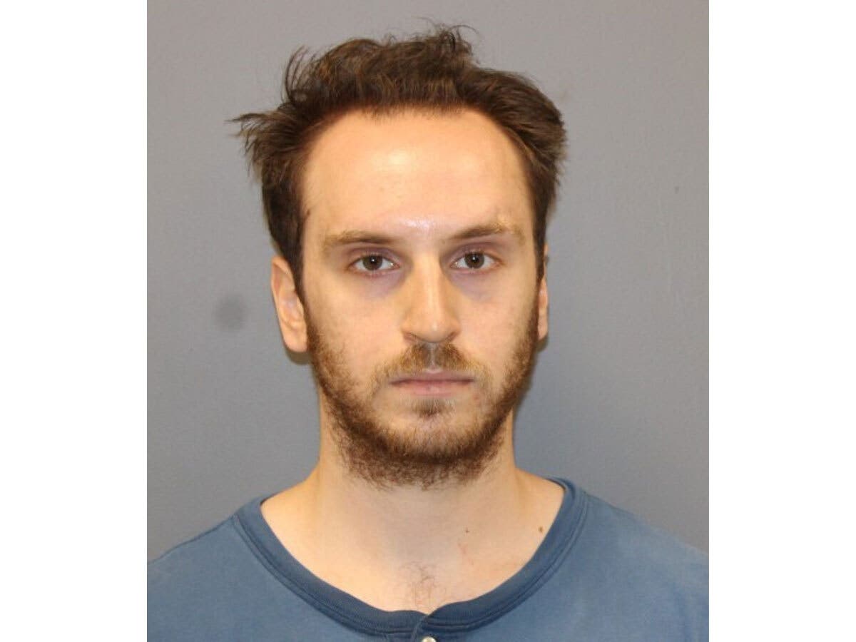 Wilton police said Scott Dobos, 24, was arrested after a juvenile reported being sexually assaulted while jogging near Allen's Meadows.