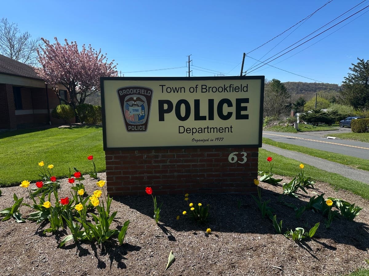 Brookfield police are investigating after a missing person was found dead near an ATV in a wooded area off Candlewood Shores Road.