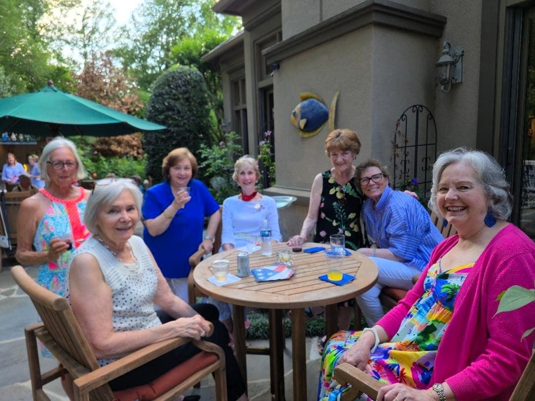 Some of the members of Lewinsville’s Second Saturday Set gathered to celebrate the group’s 60th anniversary.