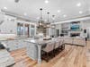 Chef-style kitchen with commercial Thermador appliances and luxurious finishes
