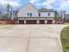 2-car garage on the main level, plus 5 car AC/Heated garage with workshop on the terrace level.  Bring ALL your toys.