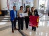 Photo: Luis Martinez (City of Orlando), Cláudia Menezes (Visit Orlando), Vanessa Caetano Salmeron (ABI Inter/Midia America), and artist Adriana Moa.