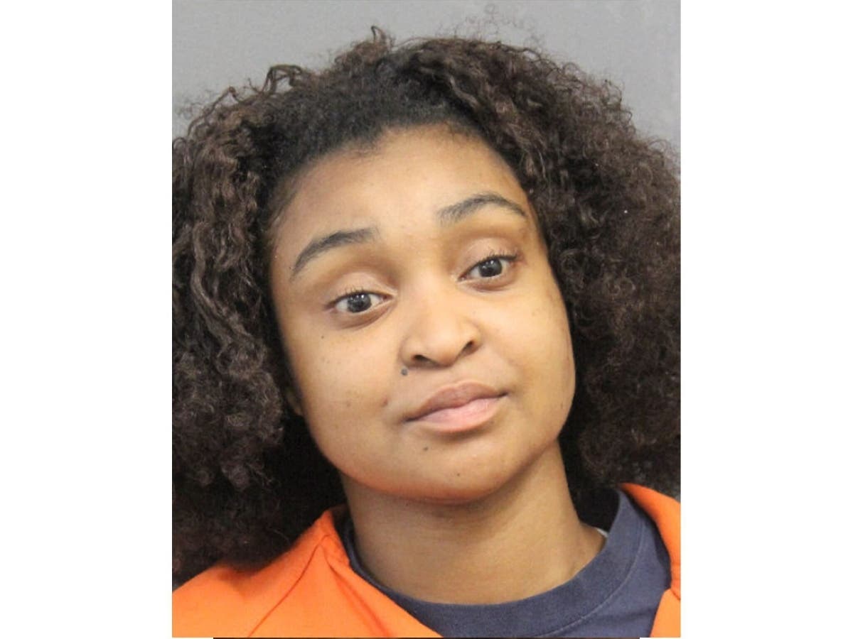 Jasmine Thomas is charged with manslaughter and other offenses after police said she crashed into a vehicle, killing two people inside it.