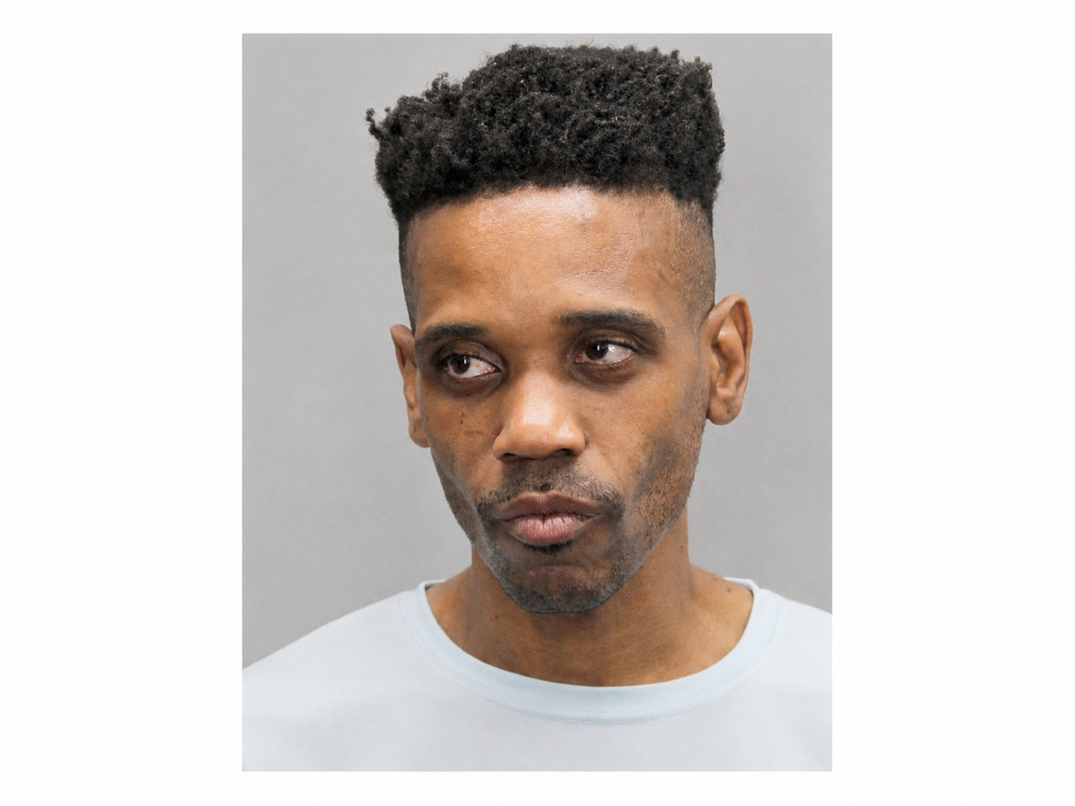 Charles Vincent Jones II is accused of assaulting a boy in a bathroom stall.