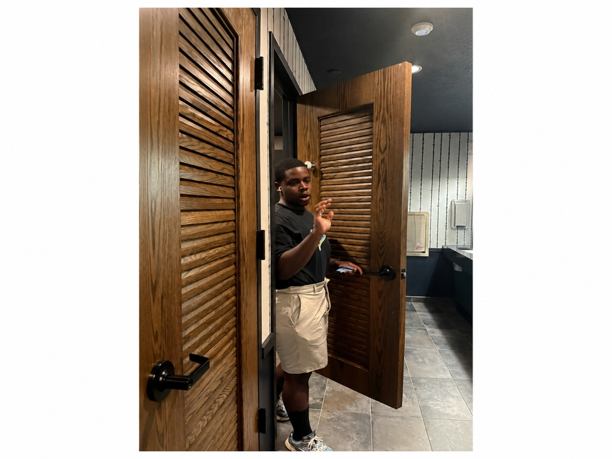 The man is suspected of illegally filming a woman in a bathroom. 
