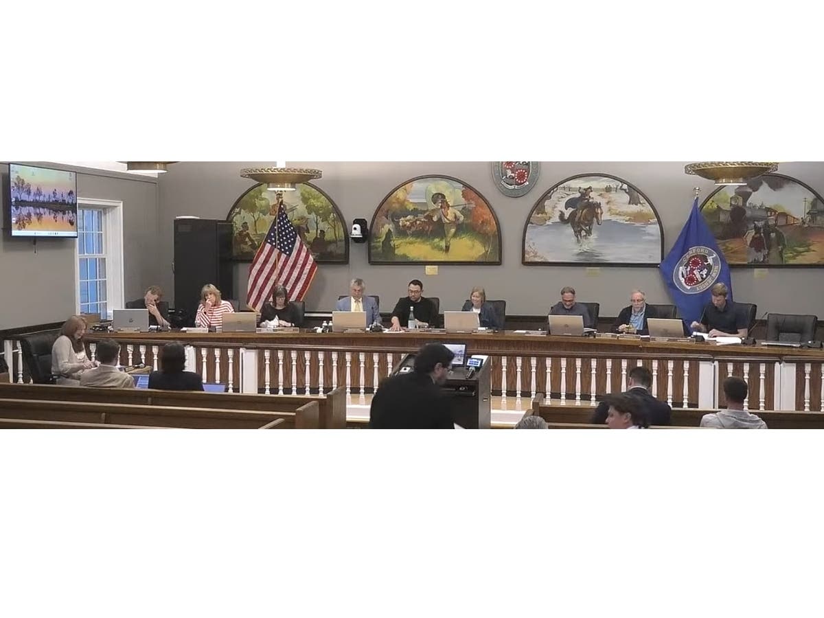 A Planning Board hearing became tense during a parking discussion.