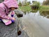 Discovering tadpoles in our neighborhood pond.