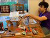 Rohan Agarwal, sophomore at Monta Vista High School, works on the OsmoFlux prototype at his home in Cupertino, CA