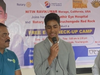 Nitin Ravikumar leads a preventative eye care education session at a free vision screening camp in Tiruchengode, India, 2022.