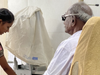 A community elder receives a clinical eye examination at the Tiruchengode, India vision screening camp, 2022.