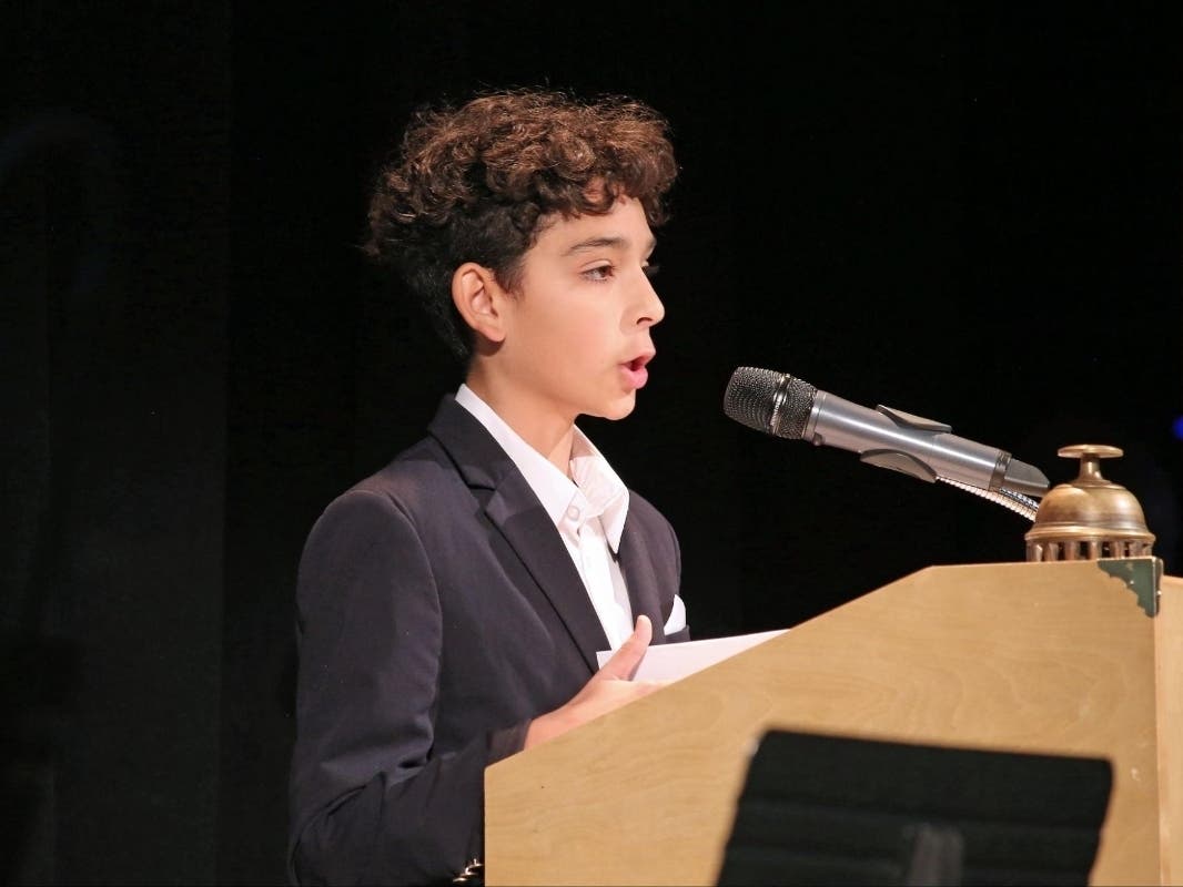 As part of their eighth-grade capstone experience, students reflect on their learning, personal growth, and experiences at Unquowa, sharing their stories with the school community during Assembly.
