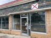 The image is an up-to-date photo of one of the abandoned slots on Swanton and Washington Street.
