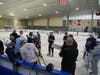 Head Coach Dave Belbin draws on his dry erase board as he reviews the stations for the clinic with the varsity players.