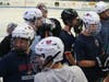 WHS Varsity & JV Players are all smiles getting on the ice to begin the clinic.