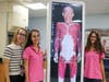 Dr. Kristin Hayden with seniors Isabella Bayas and Alexandra Bennett and the Anatomage Table 