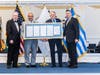 Rhode Island State Senator David Tikoian and Rhode Island State Senator Leonidas Raptakis present a beautiful Senate Resolution commemorating 100 years of Chapter 106