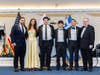 Scholarship Recipient photo from left to right: Scholarship Chairman Dimitrios T. Markos, Esq., Gianna Degaitas, George Grammas, Peter Grammas, Constantine Coclin, and Chapter 106 President George Coclin