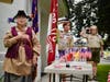 Community members and Scouts stand together in a moment of patriotic reflection during the Unionville Museum’s semi-quincentennial celebration.