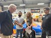 Larry Wood chatting with guests from Long Beach City College and local non-profit WERKS.