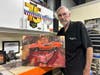 Larry displaying his design for his first Hot Wheel car.