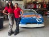 New members, Ruby and Nicole, striking a pose with Hot Wheels car.