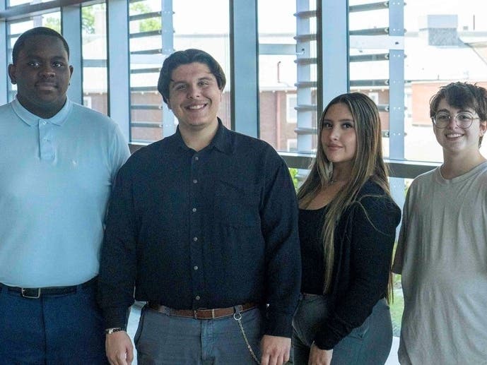 Silver Scholars, from left, Chad Sharpe, Andrew Fiocco, Samantha Agudelo Argote and Mio Luciani, gained an inside look at the practice of medicine while learning alongside healthcare professionals at Stamford Hospital.