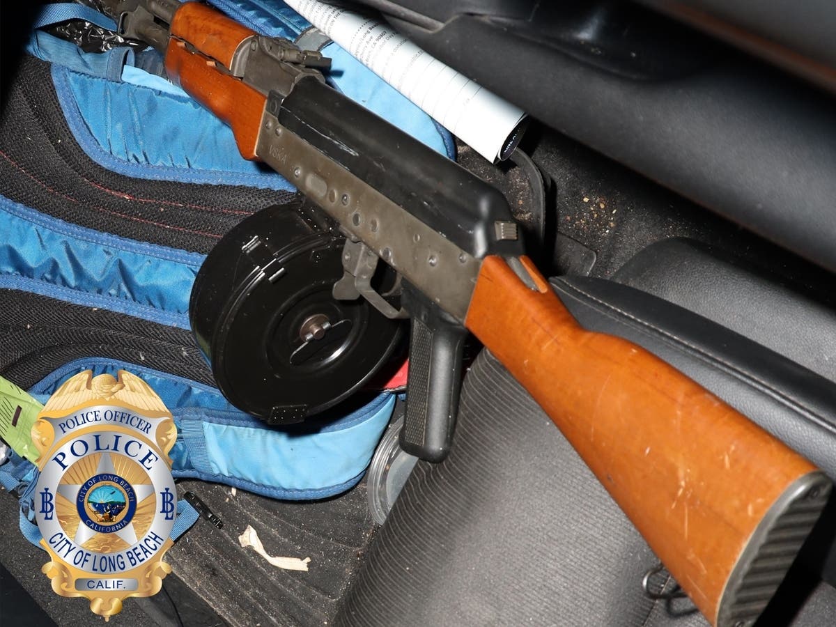 A firearm recovered appears to be a VSKA AK-style assault rifle fitted with a large-capacity drum magazine. However, LBPD has not confirmed this.