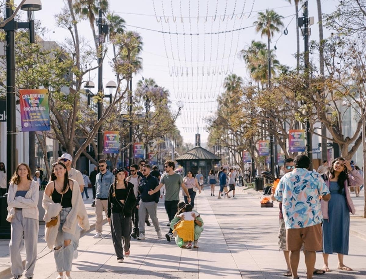 Visitors walk along Santa Monica's Third Street Promenade, where city officials are working to attract businesses and revitalize the downtown economy through faster permitting, reduced fees and new financial incentives.