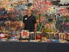 Summer intern Michael Bria helped organize and display free books.