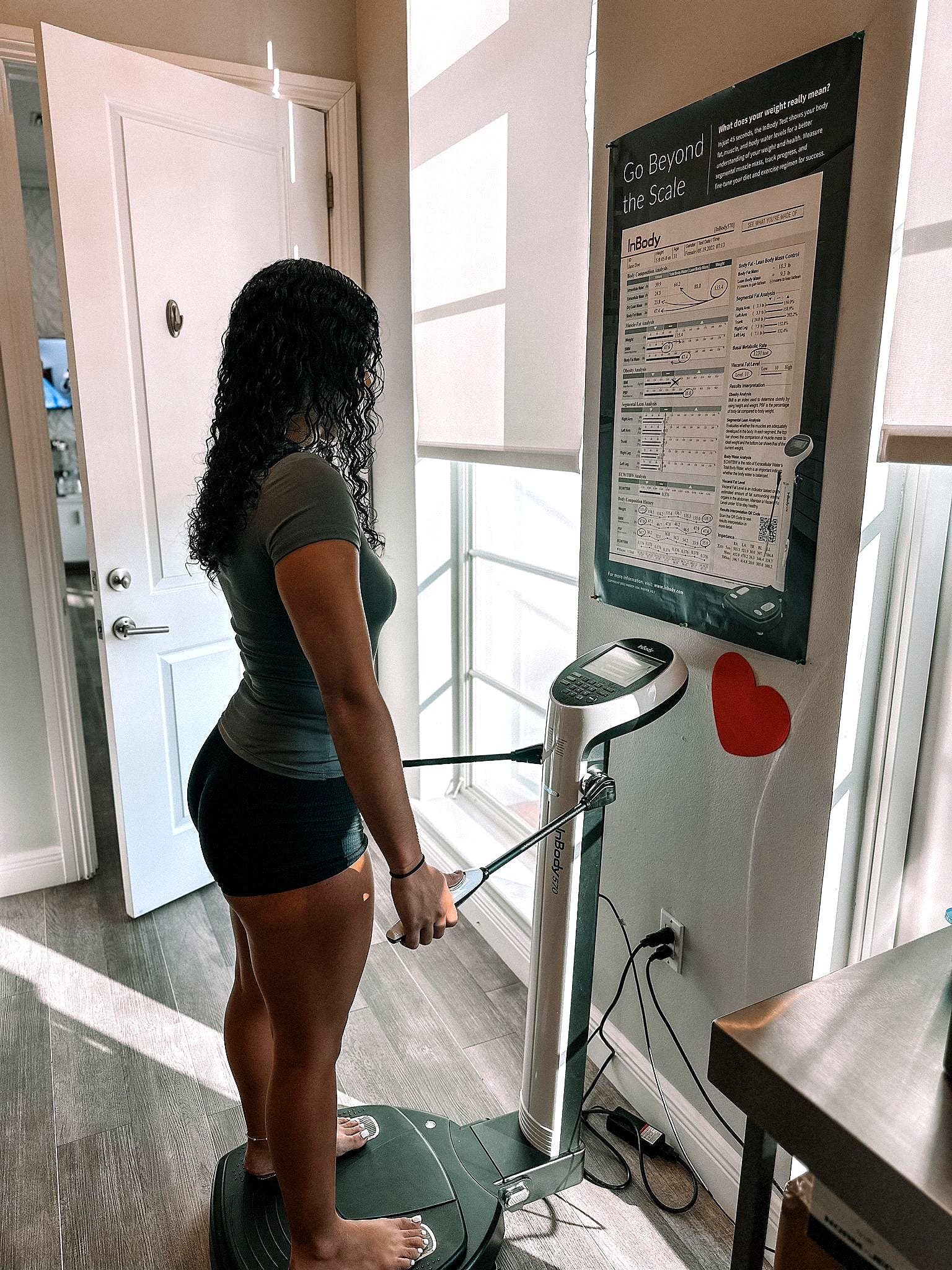 Patient completing an InBody body composition scan at Refresh - Aesthetics & Wellness in Florida