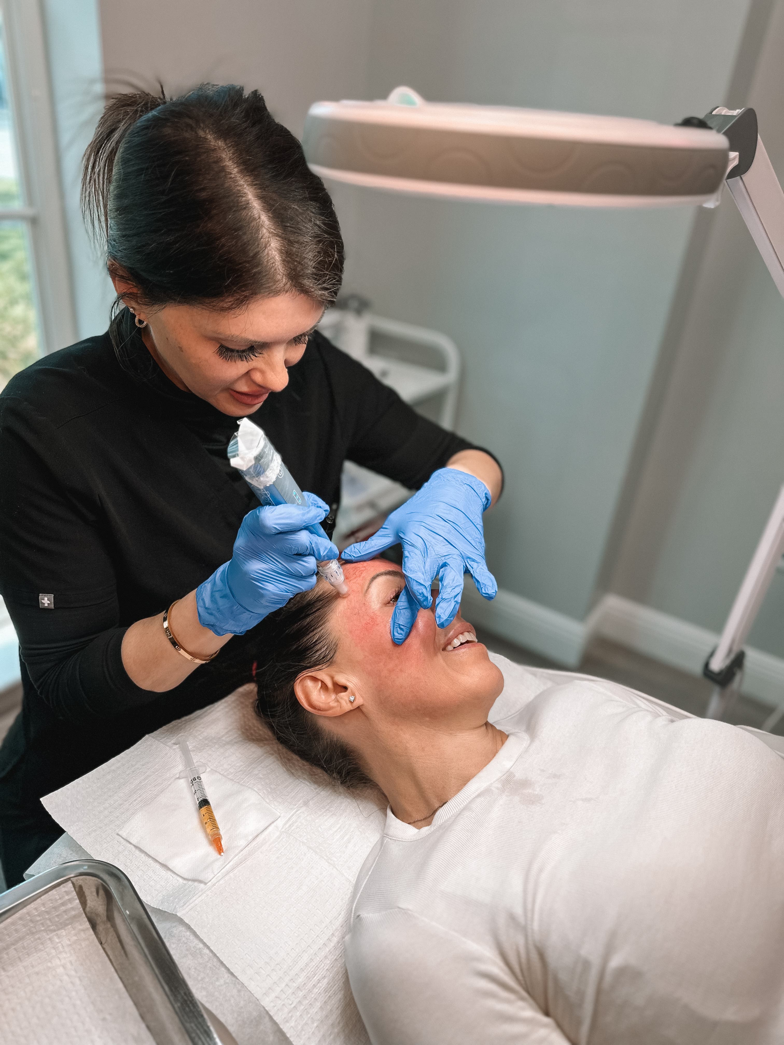 Refresh - Aesthetics & Wellness provider performing collagen induction microneedling on a patient’s face