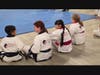 Sitting ringside at the Adult Black Belt division in Katy, Texas! 🥋 Great martial artists are always students first—watching every move, technique, and strategy to build for her own black belt journey ahead.