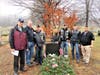 From left Brookfield VFW Post  members Gene Roberts, Joe Beal, John Kennedy, Brian D'Ambrosia, Al Smith and Chris Delia stand with Gold Star Mom and Program Organizer Jean Mariano at the burial site of her son former Navy Seal Jason Lewis.