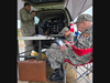 CAP Incident Command Post personnel keeping in touch with Aircraft and other communicators. Pictured, left to right are: Major Steven L. Malmgren, Cadet Chief Master Sergeant Dante Kolak  and Lieutenant Colonel Lawrence J. Hebda 