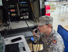 Cadet Chief Master Sergeant Dante Kolak of the Champaign Composite Squadron, communicating with another radio operator in Marseilles on VHF-FM radio. 