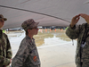 Cadet Senior Airman Tyson Cox and Cadet Airman First Class Fred Guenther observe as Major Steven L. Malmgren, Illinois Wing Director of Communications, explains how the Global Positioning Satellite system works
